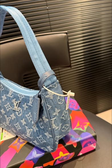 Louis Vuitton Pouchette Valley handbag in blue monogram denim