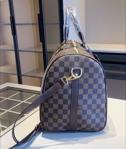Louis Vuitton Keepall Bandouliere travel bag