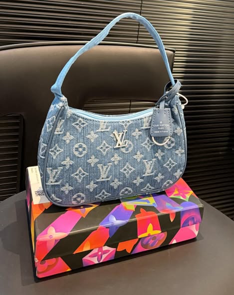Louis Vuitton Pouchette Valley handbag in blue monogram denim