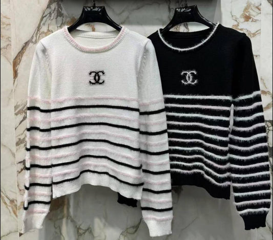 Channel long sleeved knit top with a CC logo